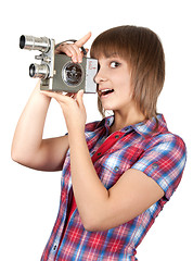 Image showing Girl in plaid shirt with movie camera