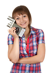 Image showing Girl in plaid shirt with movie camera