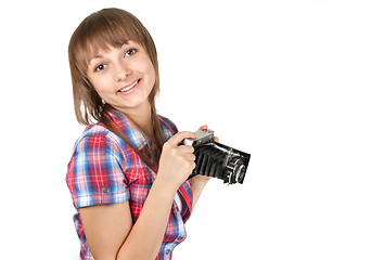 Image showing Young girl with old analog photo by camera