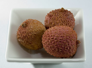 Image showing litchis on a white plate