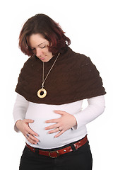 Image showing pregnant woman holding belly