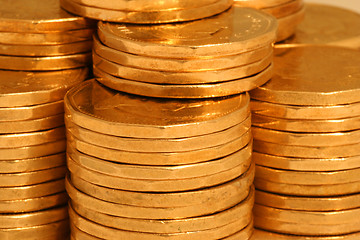 Image showing golden coins from side