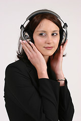 Image showing Businesswoman listening to her favorite music