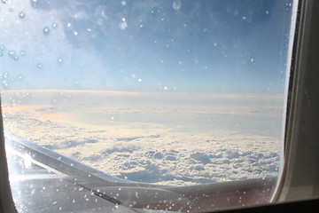 Image showing Above the clouds