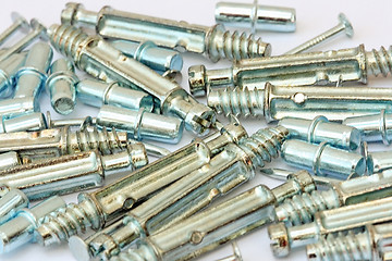 Image showing Many screws and nuts isolated on white background