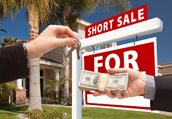 Image showing Handing Over Cash For House Keys and Short Sale Sign