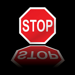 Image showing stop road sign reflection