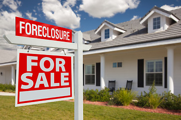 Image showing Foreclosure Real Estate Sign and House - Left