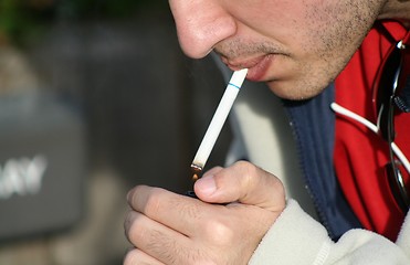 Image showing Person Smoking a Cigarette