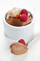 Image showing Chocolate mousse dessert with a spoon