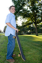 Image showing Boy with Skateboard