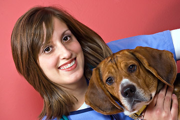 Image showing Veterinarian with a Beagle