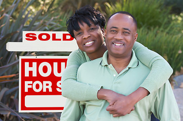 Image showing Happy Couple and Real Estate Sign