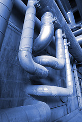 Image showing different size and shaped pipes at a power plant