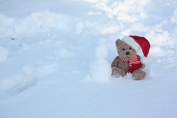 Image showing Bear making a snowman.