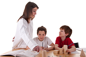 Image showing Two students with the teacher