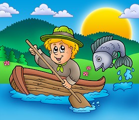 Image showing Scout boy in boat