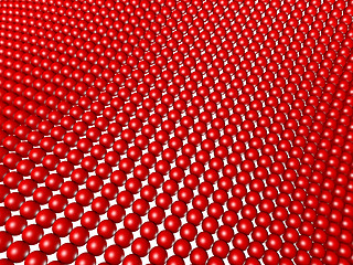 Image showing red spheres structured as grid array isolated on white.