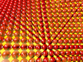 Image showing array of red spheres with binary numbers and yellow light rays.