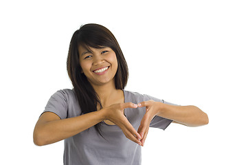 Image showing asian beauty shaping a heart