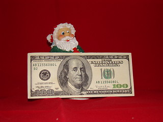 Image showing Santa with money.