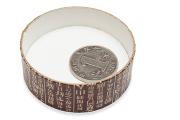 Image showing One yuan in the tea box cap