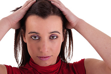 Image showing beautiful woman, holding her hair with his hands