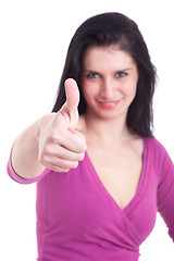 Image showing Young pretty women with thumb up