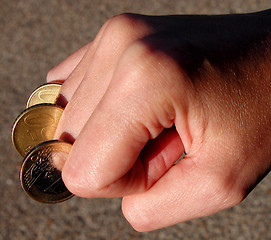 Image showing Finger-coins-power Of The Money