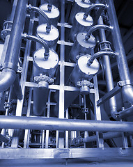 Image showing Pipes, tubes, machinery and steam turbine at a power plant