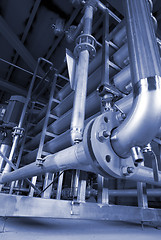 Image showing Pipes, tubes, machinery and steam turbine at a power plant