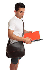 Image showing Student with brown bag and books