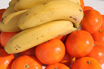 Image showing Oranges and bananas