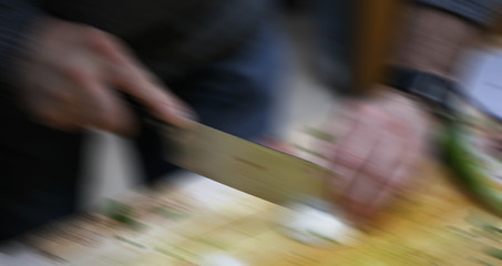 Image showing Cutting onions