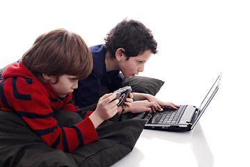 Image showing children playing computer and video games