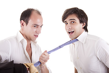 Image showing two young businessmen grasping his tie