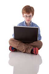 Image showing cute boy playing computer