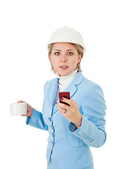 Image showing architect woman with phone and cup