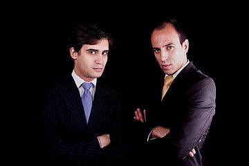 Image showing two young businessmen with a serious look