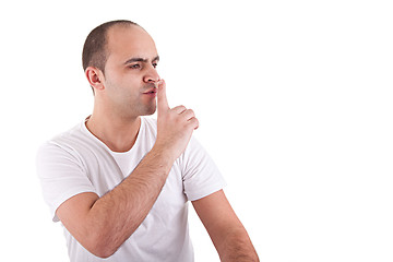 Image showing Young man asking for silence