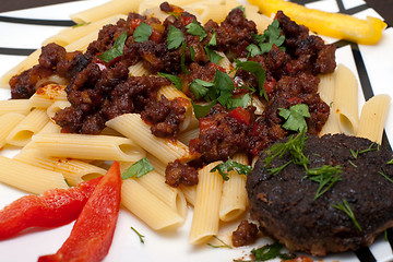 Image showing cutlet and pasta