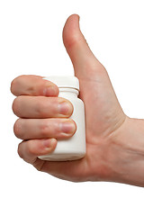 Image showing bottle with pills in hand