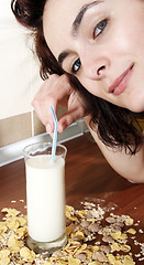 Image showing Young people eating milk with cereals