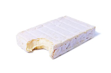 Image showing Bitten piece of Gourmet Brie Cheese