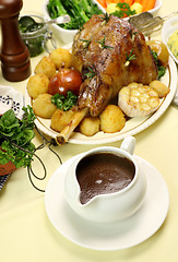 Image showing Gravy Boat With Lamb Leg