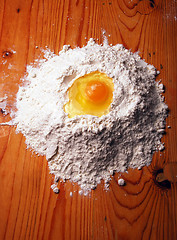 Image showing egg with flour