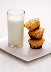 Image showing fresh muffins with milk