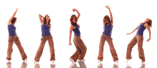 Image showing attractive teenage dancing over white background