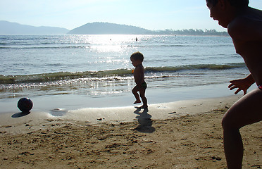 Image showing Kids playing on the beach