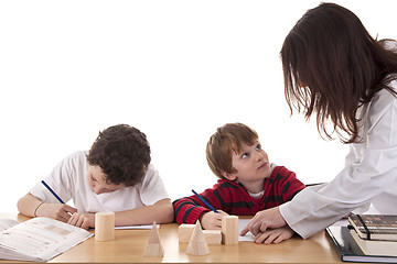 Image showing Two students with the teacher